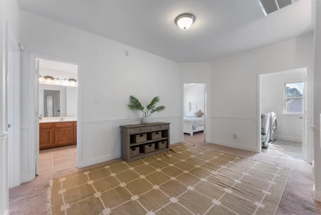 a view of a livingroom with furniture and a dinning area