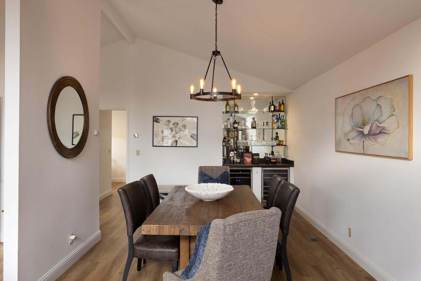 3850 Rio Road, Unit 63 Carmel, CA 93923 - Photo 9 of 19 a dining room with furniture and window