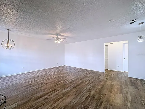 a view of a room with an empty space