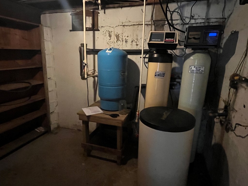 164 Nagel Road Oil City, PA 16301 - Photo 34 of 37 a close up of a storage and utility room with racks on the wall