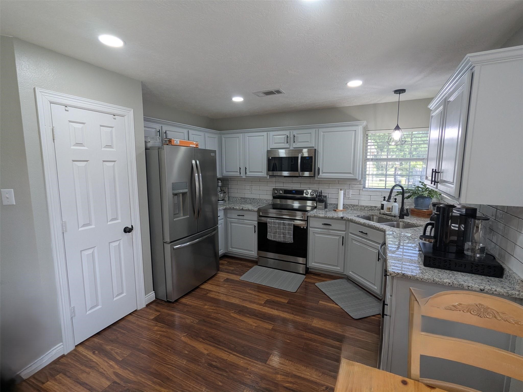 1035 North Colbert Street Dayton, TX 77535 - Photo 7 of 17 Kitchen pantry and recess lights.