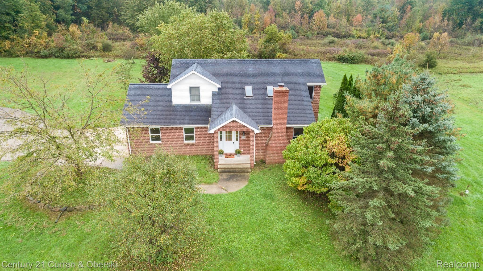 234 Frick Road Leonard, MI 48367 - Photo 1 of 38 DJI_0007.jpg