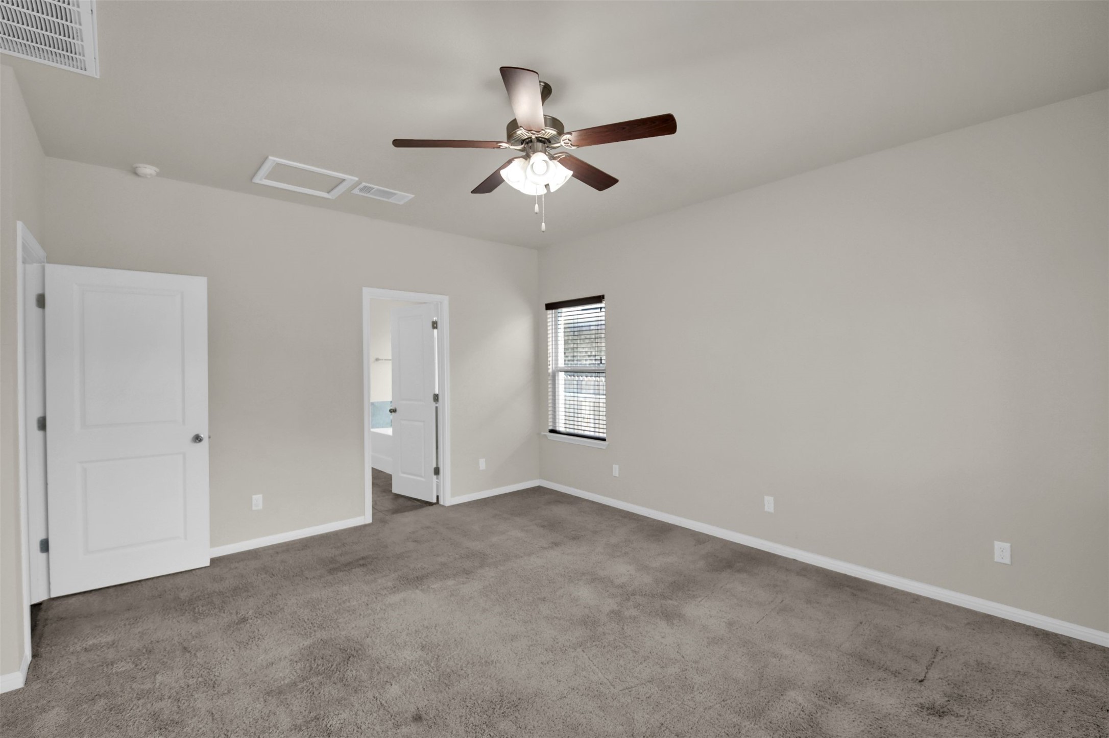 1829 Chickasaw Run Leander, TX 78641 - Photo 21 of 40 an empty room with closet and windows