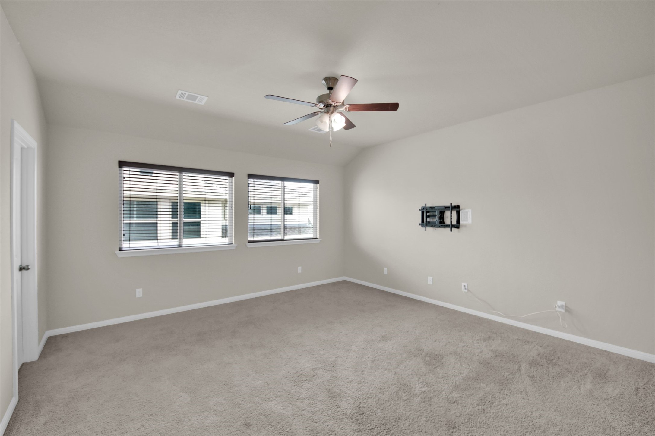 1829 Chickasaw Run Leander, TX 78641 - Photo 27 of 40 a view of a room with a ceiling fan and a window