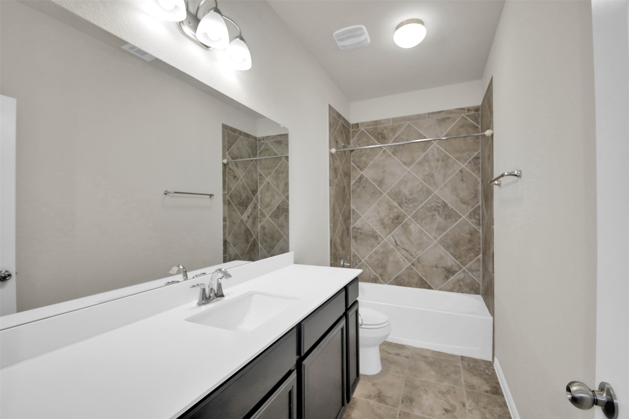1829 Chickasaw Run Leander, TX 78641 - Photo 32 of 40 a bathroom with a tub sink and mirror