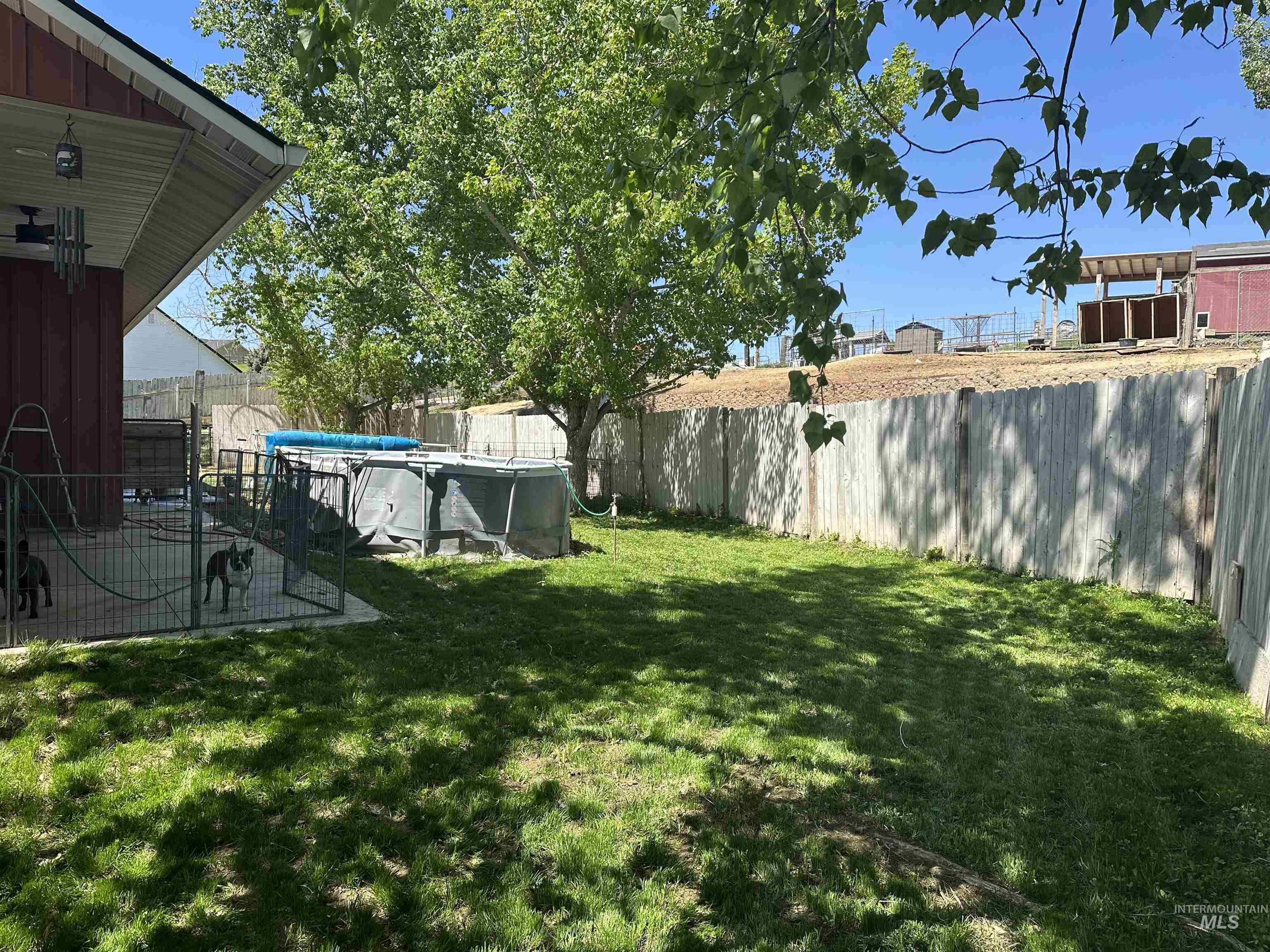 2580 Sand Hollow Road Caldwell, ID 83607 - Photo 50 of 50 Expansive green lawn with mature trees providing partial shade