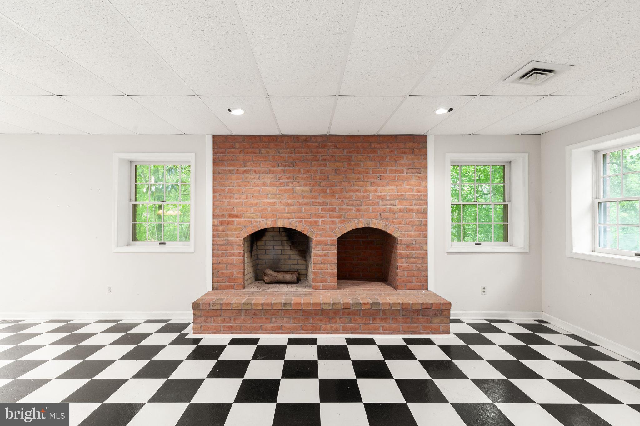 14613 Philpot Road Phoenix, MD 21131 - Photo 11 of 69 Lower Level Masonry Fireplace