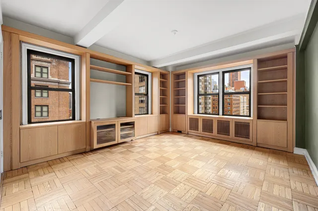 a kitchen with stainless steel appliances granite countertop a sink and a refrigerator