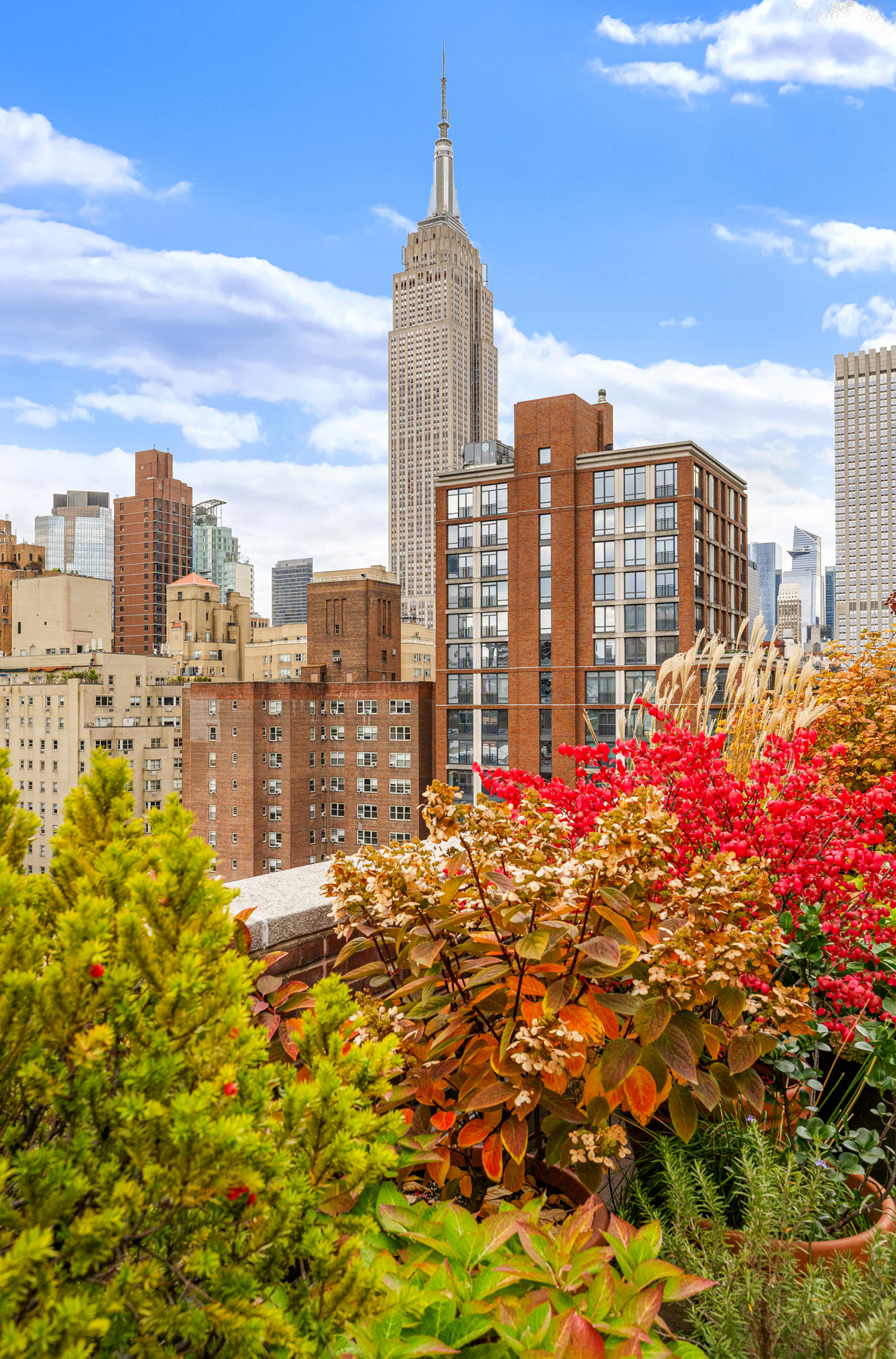 123 East 37th Street, Unit 10E Manhattan, NY 10016 - Photo 14 of 18 a view of a city with tall buildings