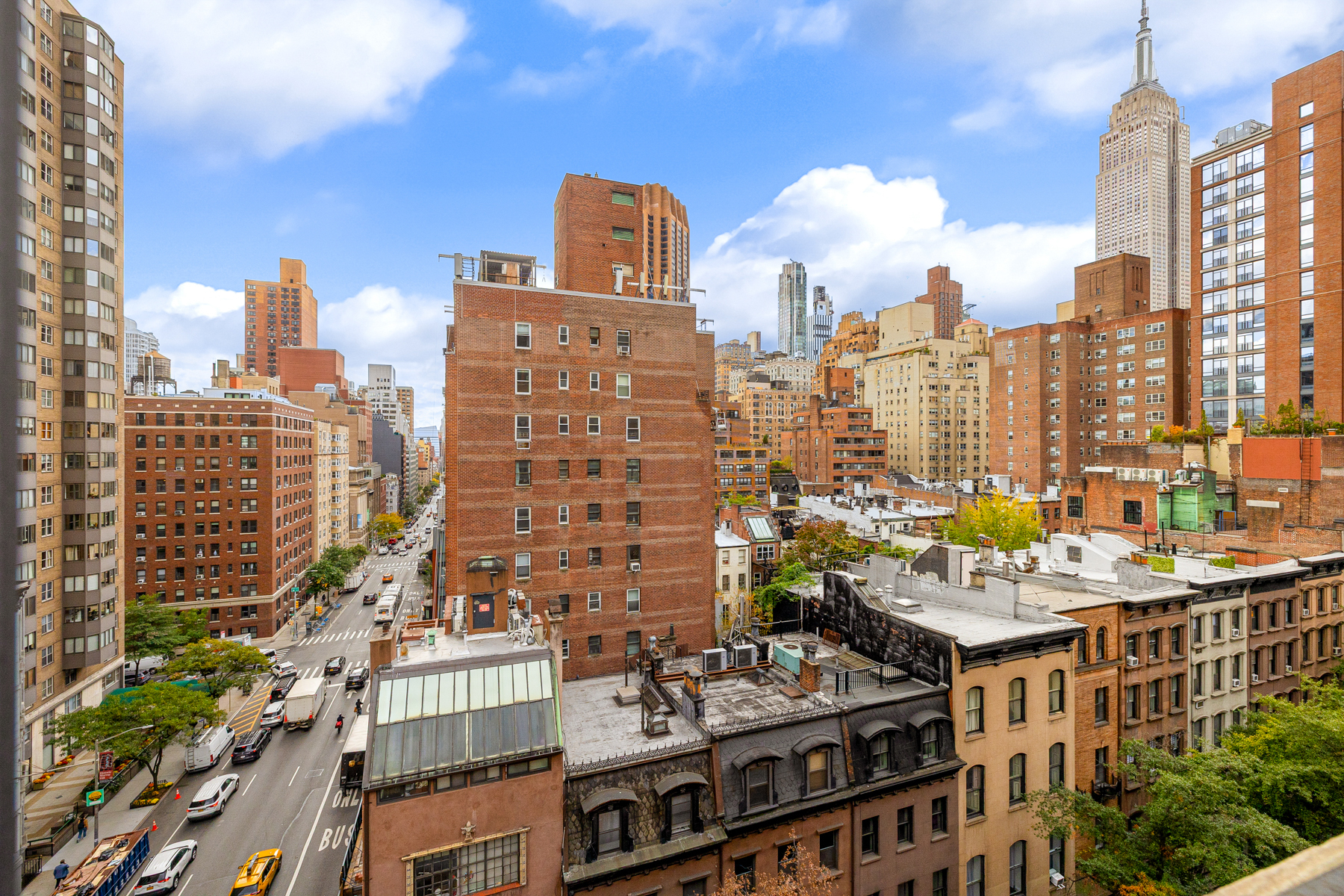 123 East 37th Street, Unit 10E Manhattan, NY 10016 - Photo 3 of 18 a view of a city with tall buildings