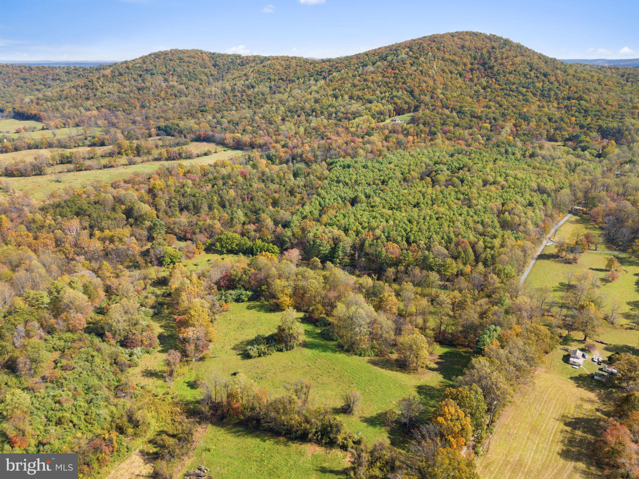 0 Moreland Road Delaplane, VA 20144 - Photo 25 of 30 a view of a large building with mountains in the background