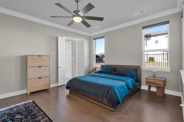 a bedroom with a bed and a table