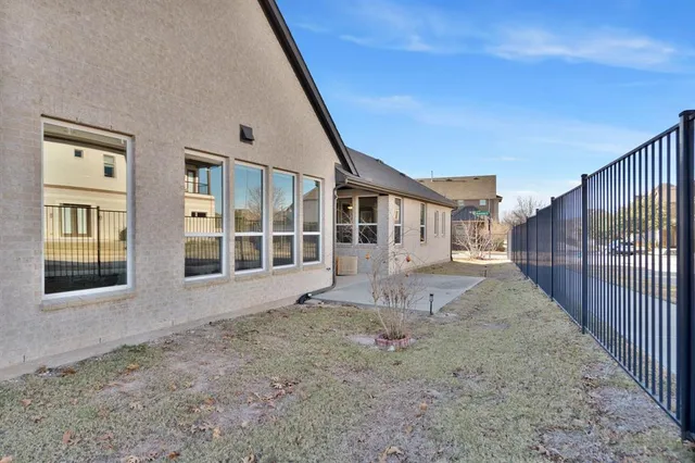a house view with a backyard space