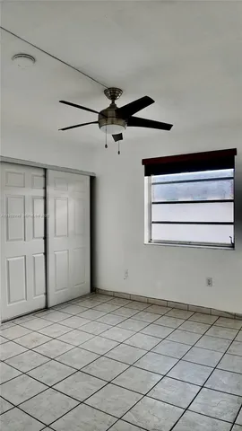 a kitchen with stainless steel appliances granite countertop a sink and a stove