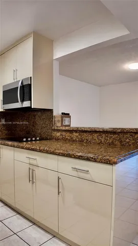 a living room with a couch and a table