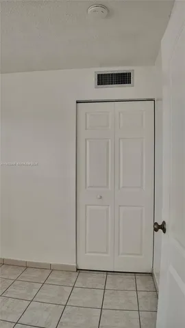 a view of a kitchen with a sink