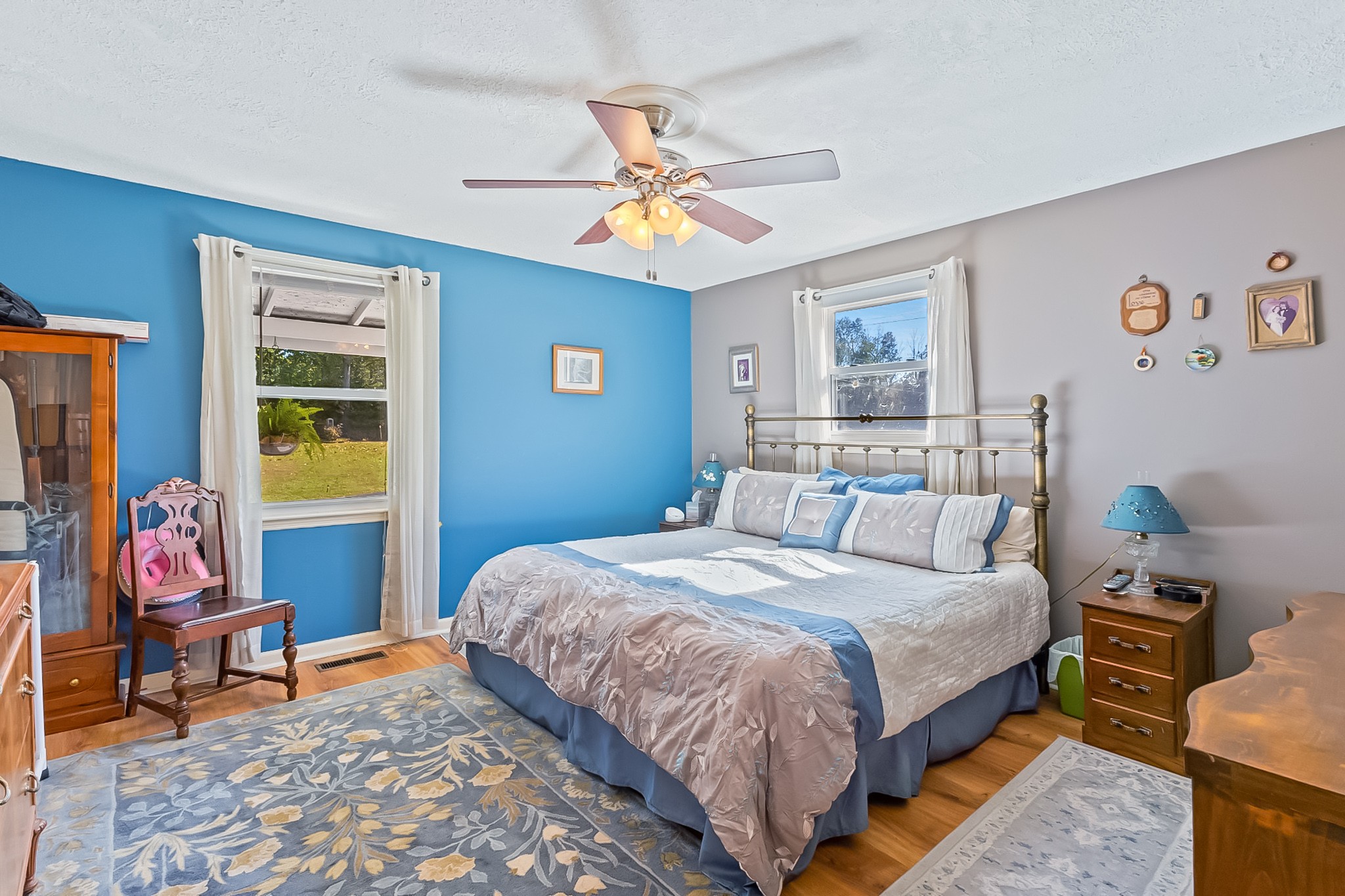 2760 Cave Springs Road Springfield, TN 37172 - Photo 11 of 74 a bedroom with a bed and a chandelier