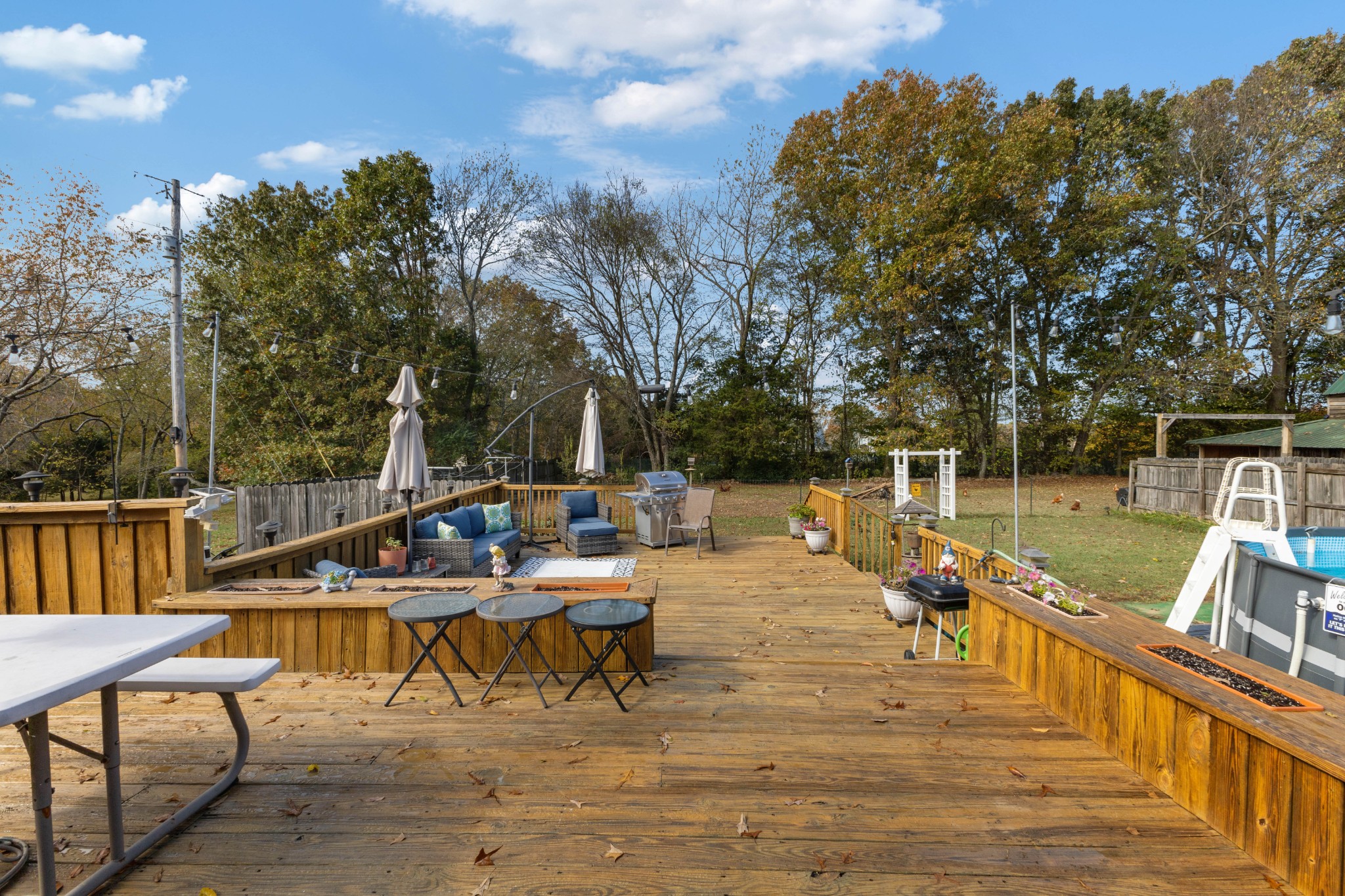 2760 Cave Springs Road Springfield, TN 37172 - Photo 24 of 74 a view of a lake with a table and chairs