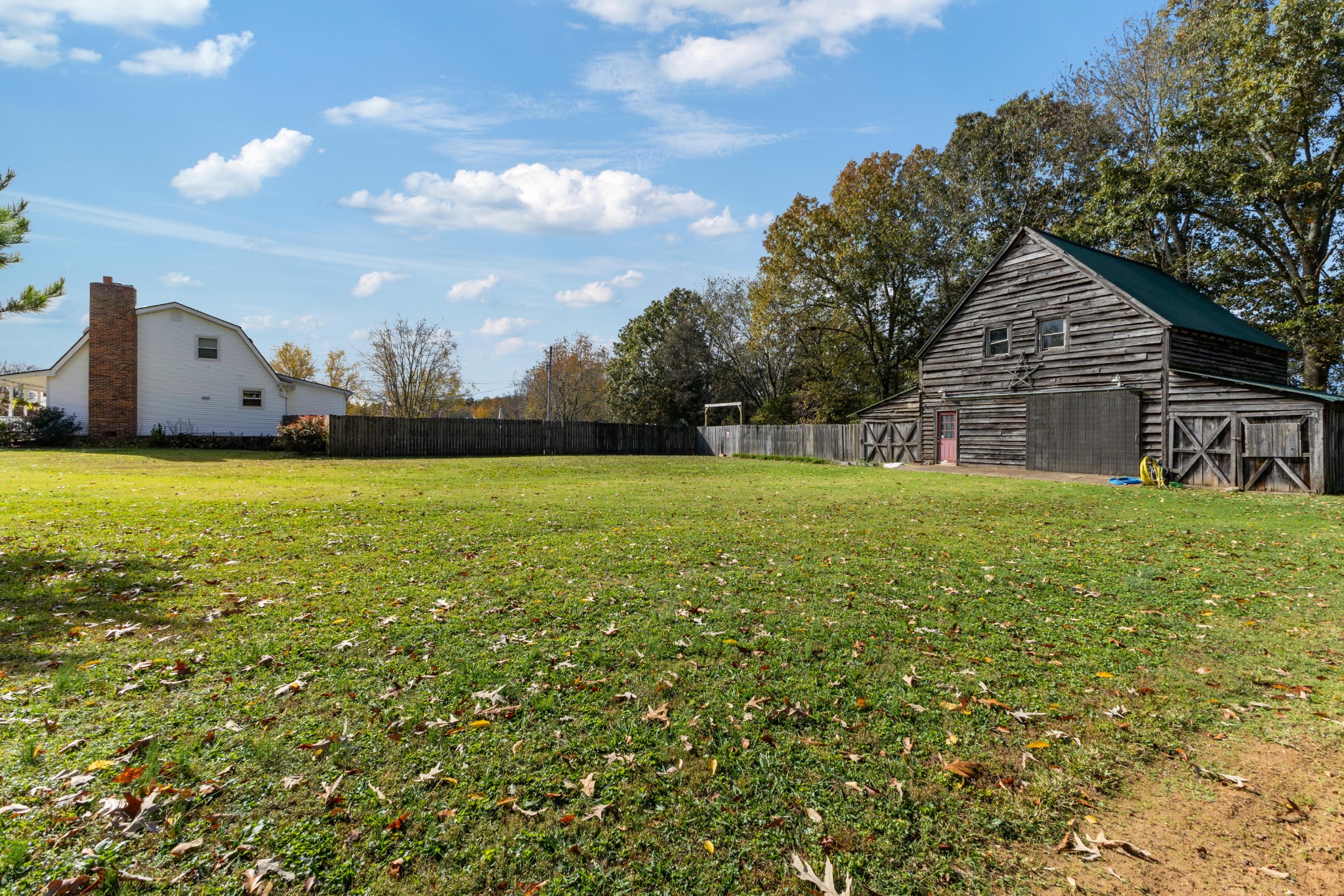 2760 Cave Springs Road Springfield, TN 37172 - Photo 32 of 74 a view of a house with a yard and a garage