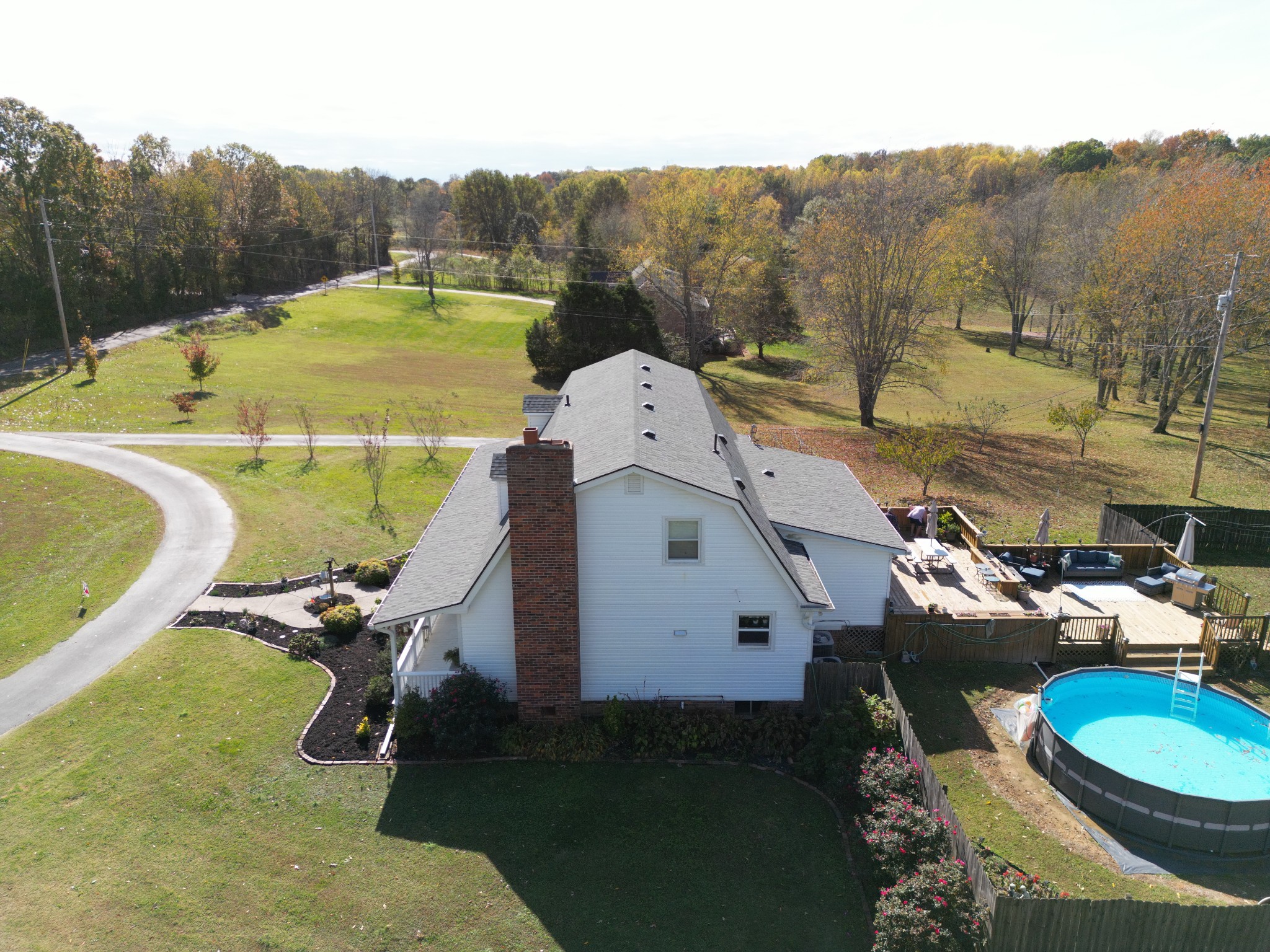 2760 Cave Springs Road Springfield, TN 37172 - Photo 46 of 74 a view of a swimming pool with a yard and furniture