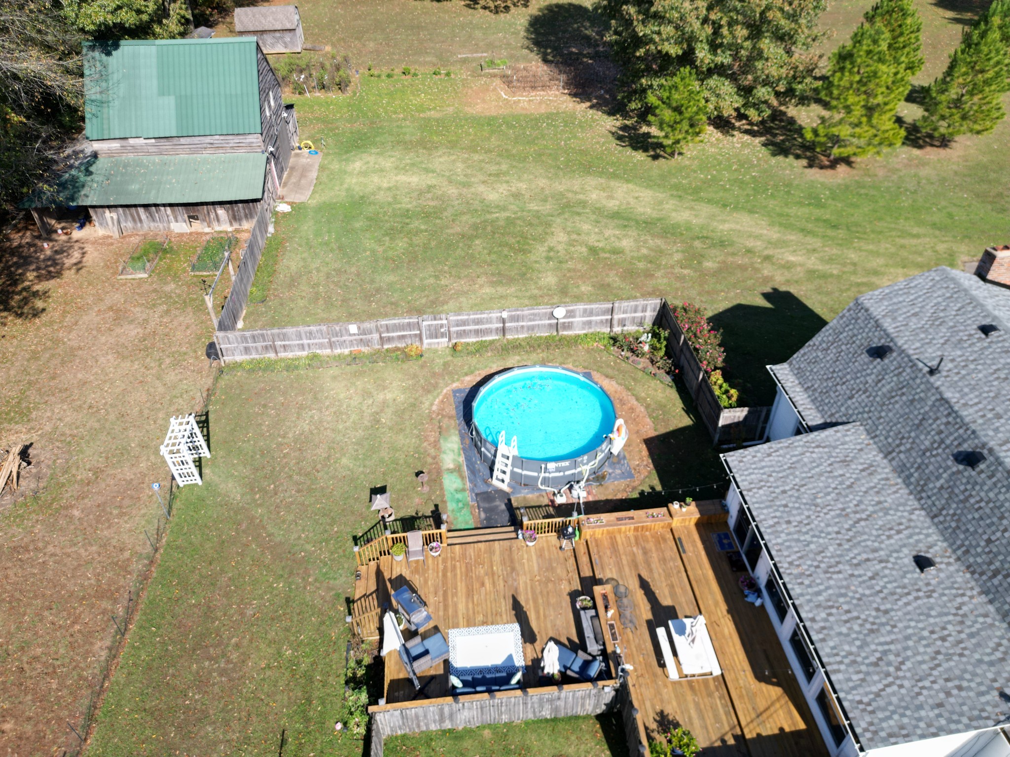 2760 Cave Springs Road Springfield, TN 37172 - Photo 51 of 74 an aerial view of a house with a swimming pool