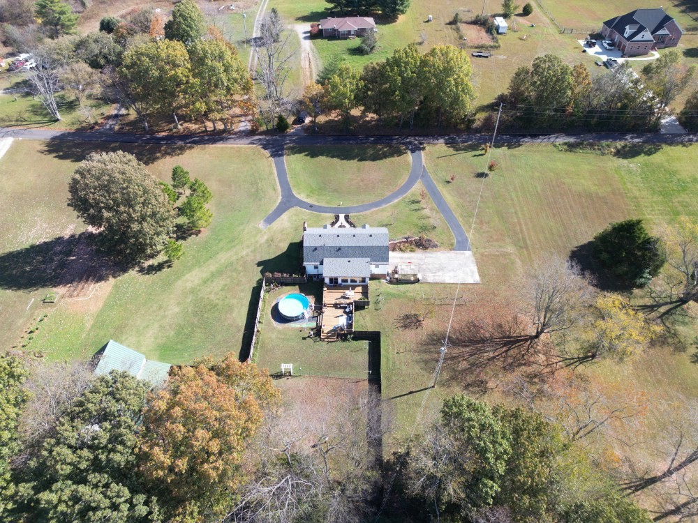 2760 Cave Springs Road Springfield, TN 37172 - Photo 56 of 74 an aerial view of a house with a yard and lake view