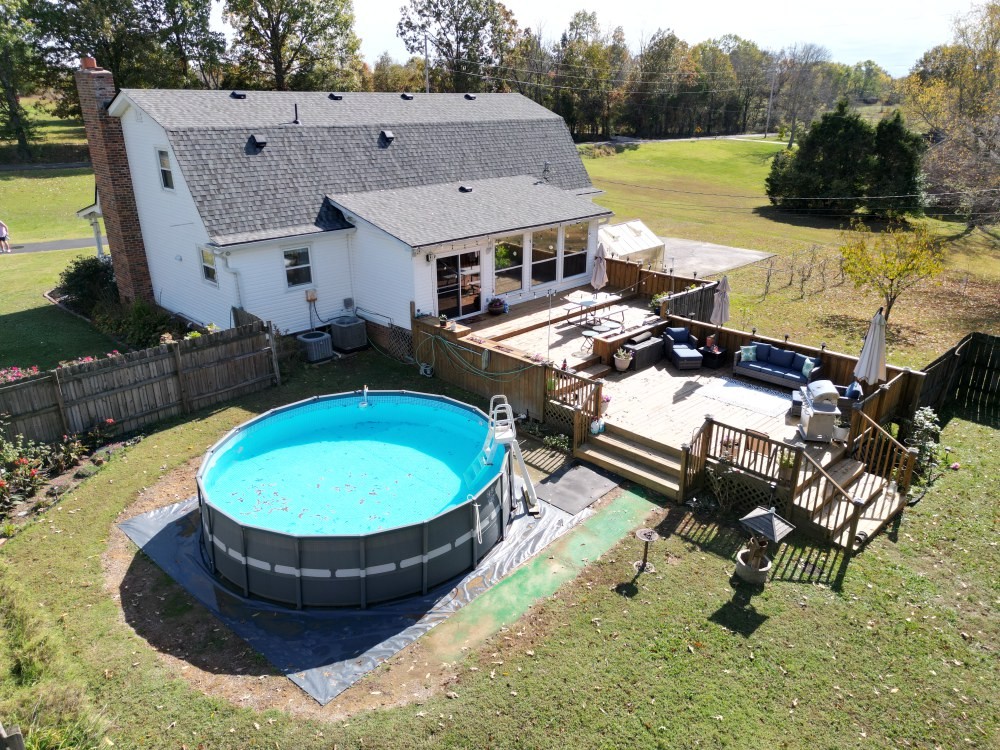 2760 Cave Springs Road Springfield, TN 37172 - Photo 69 of 74 a view of a swimming pool with a patio and backyard