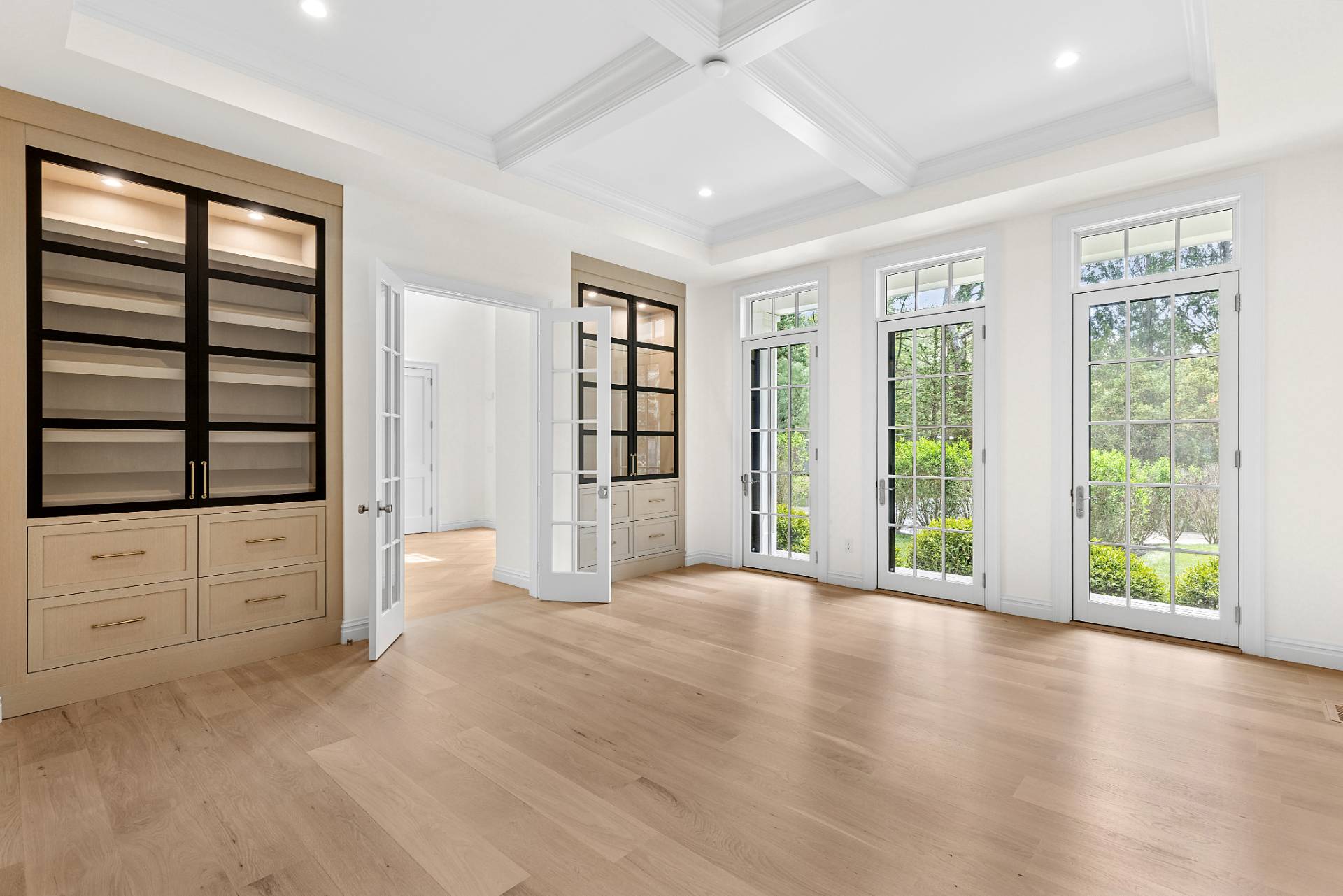 73 Wainscott Stone Road Wainscott, NY 11975 - Photo 11 of 27 a view of an empty room with a window and wooden floor