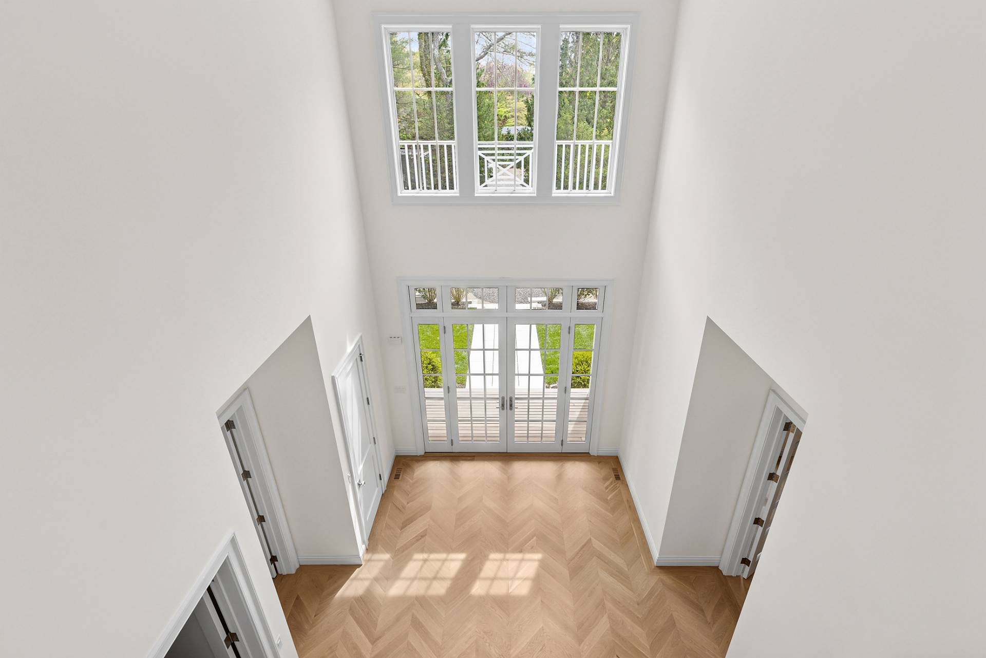 73 Wainscott Stone Road Wainscott, NY 11975 - Photo 4 of 27 a view of an entryway with wooden floor