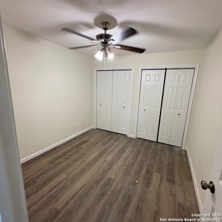 428 North Vaughan Avenue, Unit 3 Seguin, TX 78155 - Photo 3 of 7 a view of an empty room with wooden floor