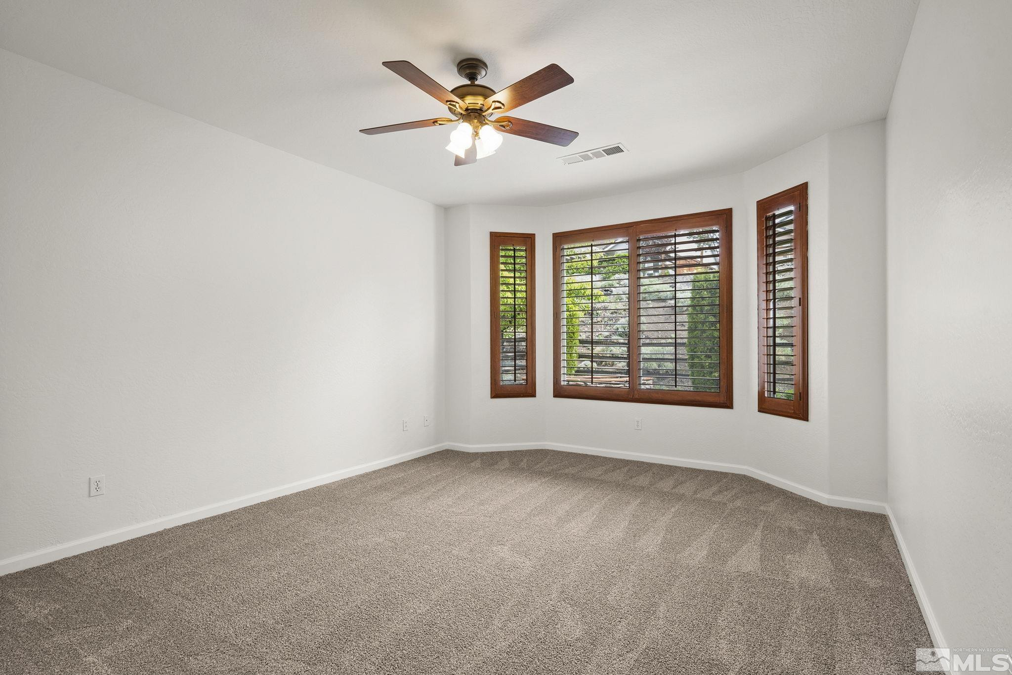 1280 Meridian Ranch Drive Reno, NV 89523 - Photo 17 of 41 a view of an empty room with a window