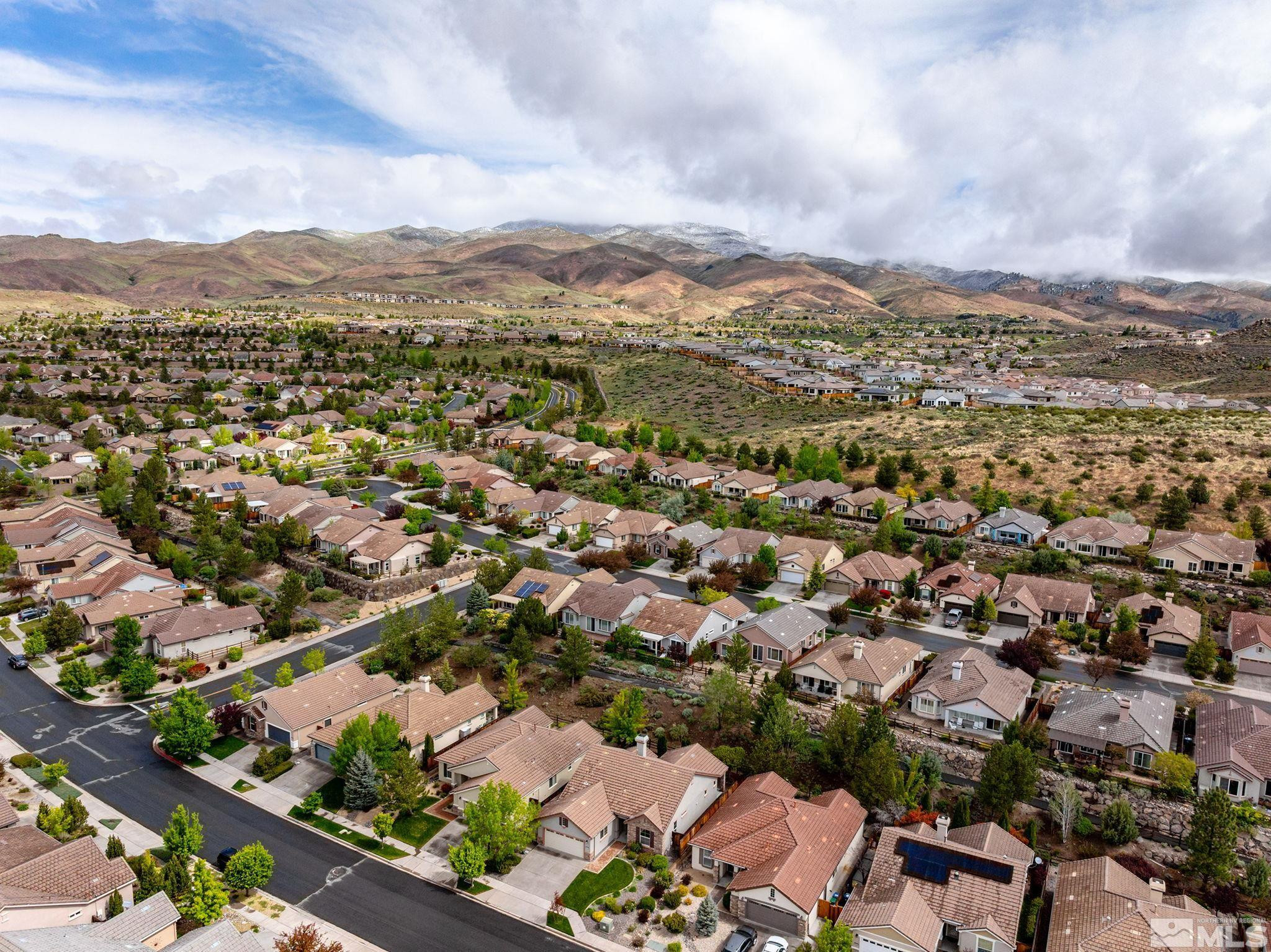1280 Meridian Ranch Drive Reno, NV 89523 - Photo 30 of 41 an aerial view of residential houses with outdoor space and trees