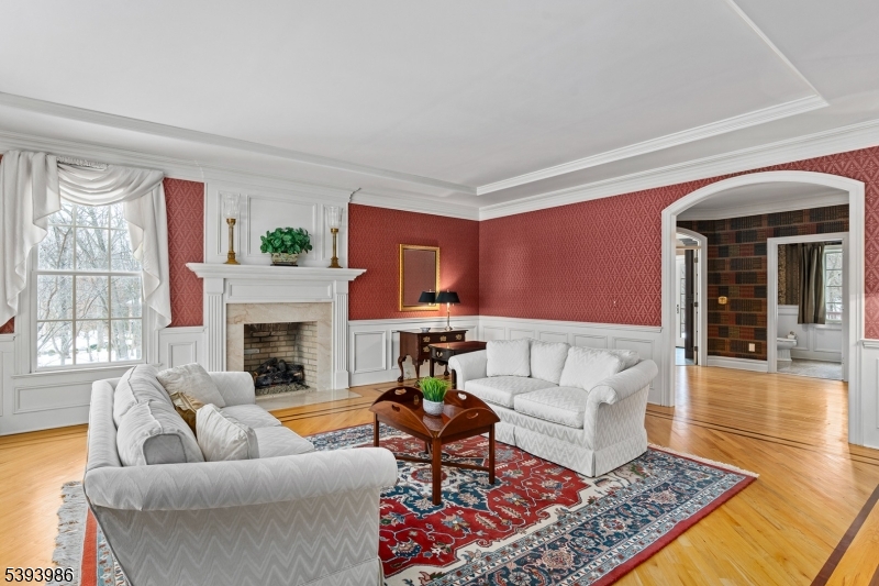 7 Timber Ridge Road Far Hills, NJ 07931 - Photo 14 of 49 a living room with furniture and a fireplace