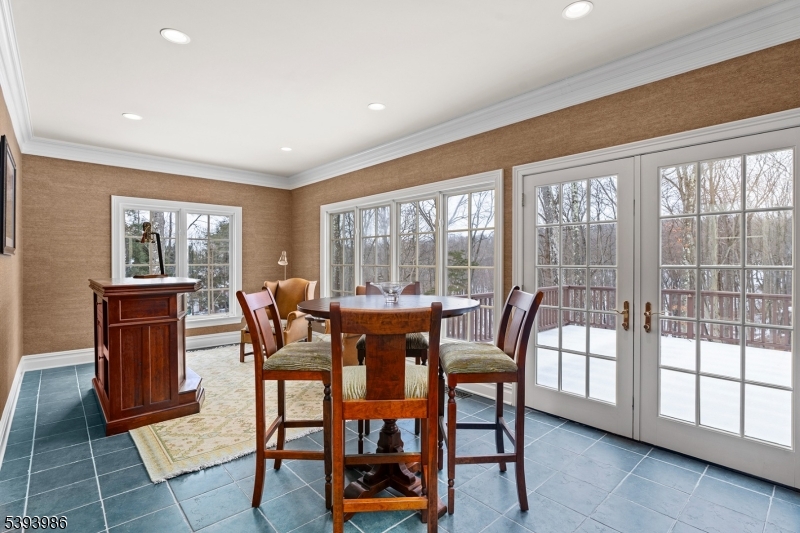 7 Timber Ridge Road Far Hills, NJ 07931 - Photo 18 of 49 a dining room with furniture a chandelier and wooden floor
