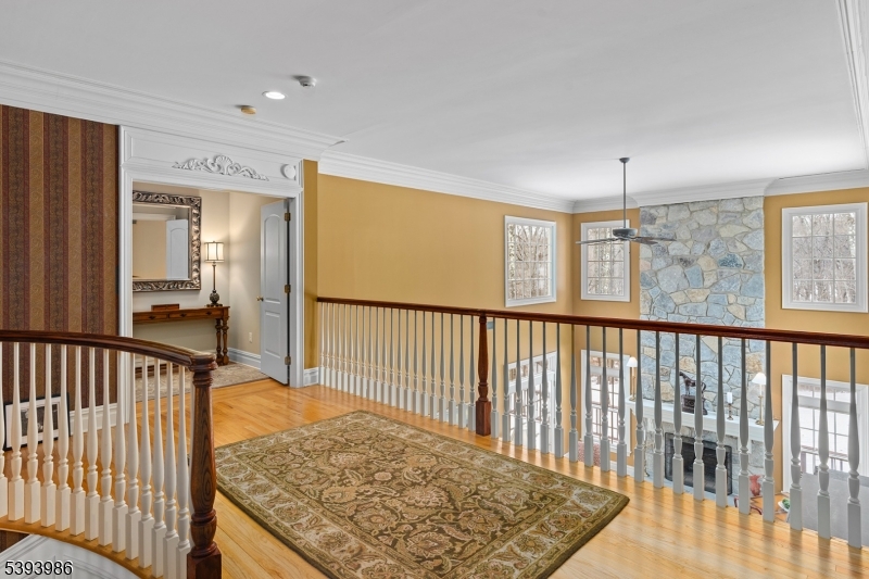 7 Timber Ridge Road Far Hills, NJ 07931 - Photo 23 of 49 a view of hallway with a rug and a window