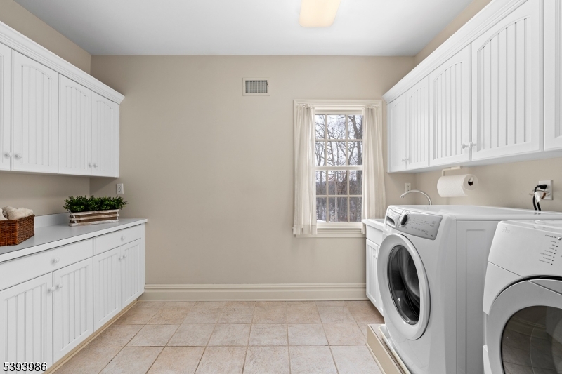 7 Timber Ridge Road Far Hills, NJ 07931 - Photo 38 of 49 a utility room with closet dryer and washer