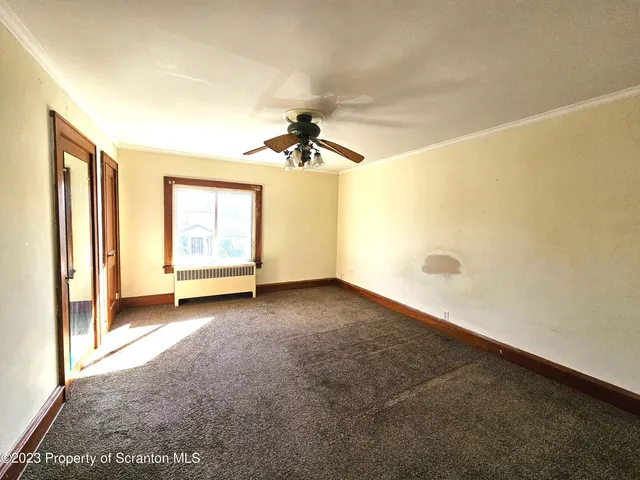 a view of a livingroom with a window