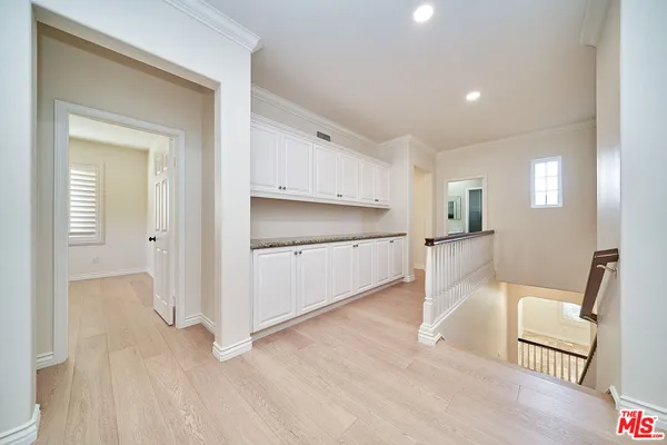 a view of kitchen and a window