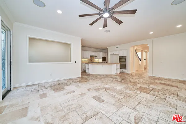 a view of a kitchen with a stove and kitchen view