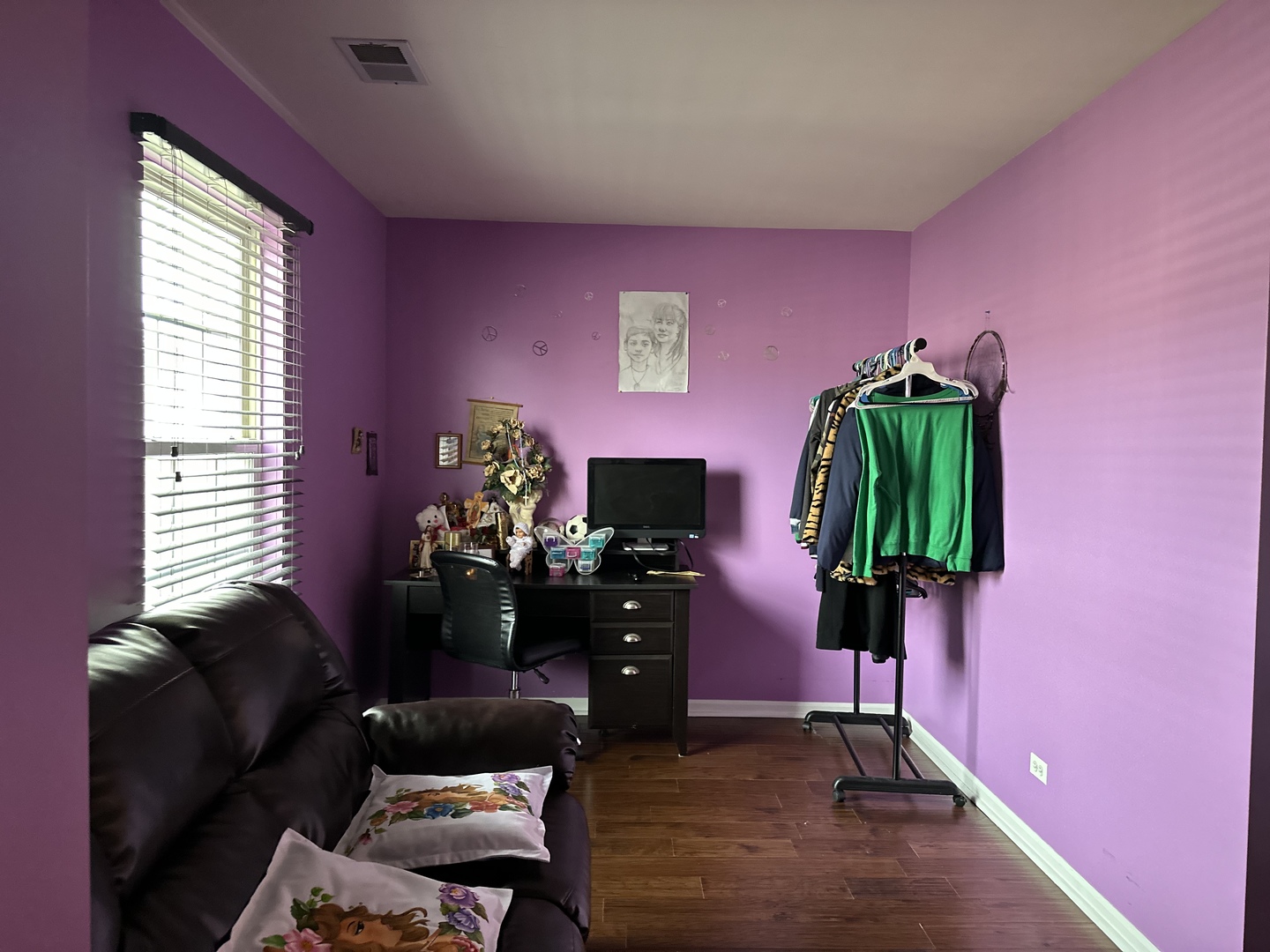 2255 Reflections Drive Aurora, IL 60502 - Photo 16 of 20 a living room with furniture and a potted plant