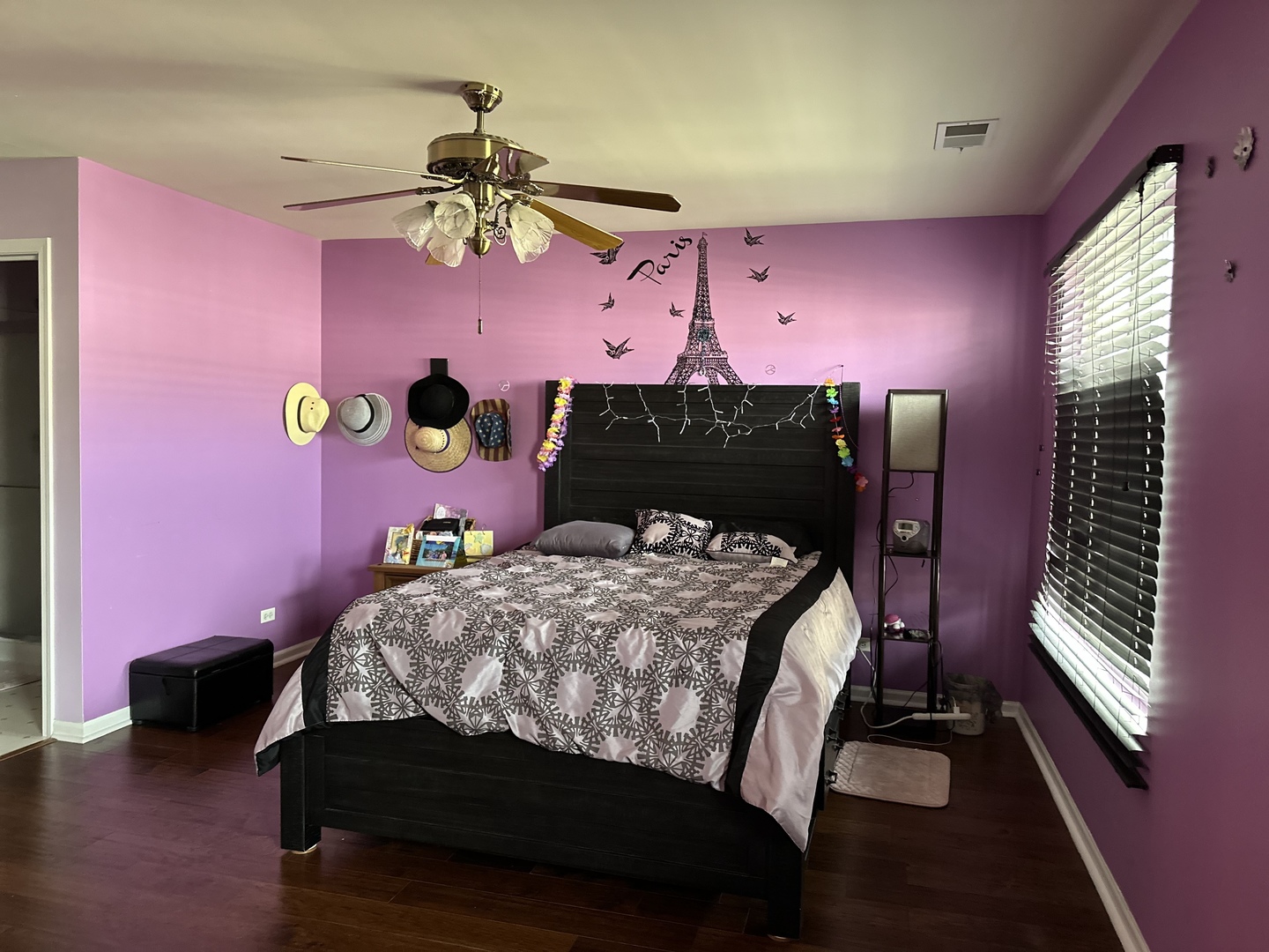 2255 Reflections Drive Aurora, IL 60502 - Photo 17 of 20 a bedroom with a bed and a chandelier