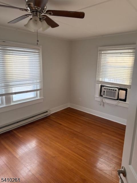 25 Flanders Road Netcong, NJ 07857 - Photo 4 of 14 a view of an empty room with wooden floor and a window