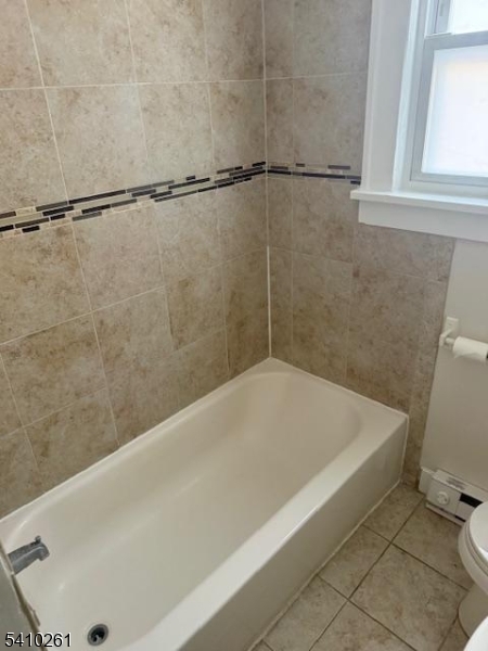 25 Flanders Road Netcong, NJ 07857 - Photo 9 of 14 a view of a bath tub sitting in a bathroom