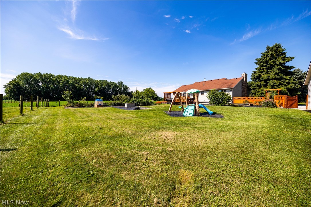 14120 Mason Road Vermilion, OH 44089 - Photo 40 of 50 View of yard with a playground
