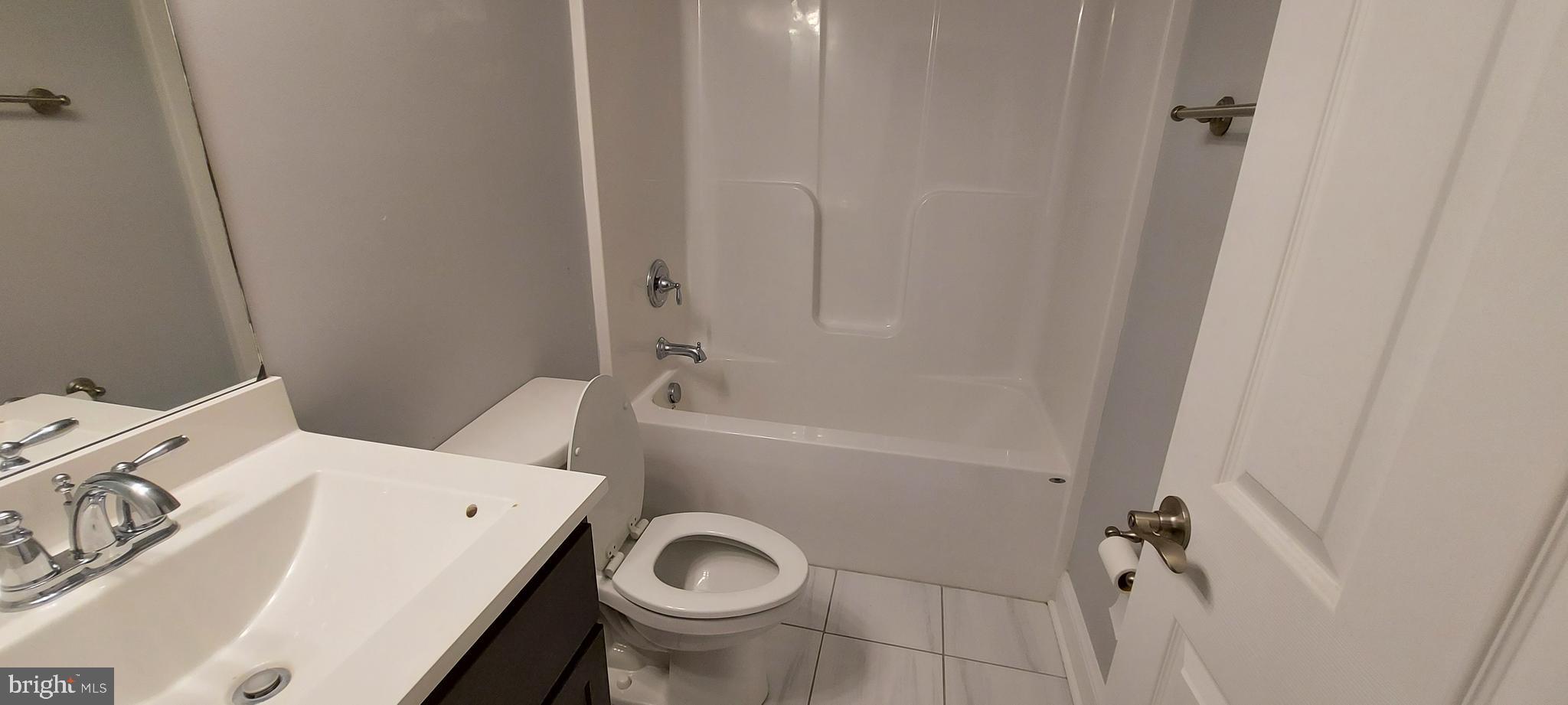 1056 Rye Drive La Plata, MD 20646 - Photo 23 of 23 a bathroom with a sink a toilet and shower