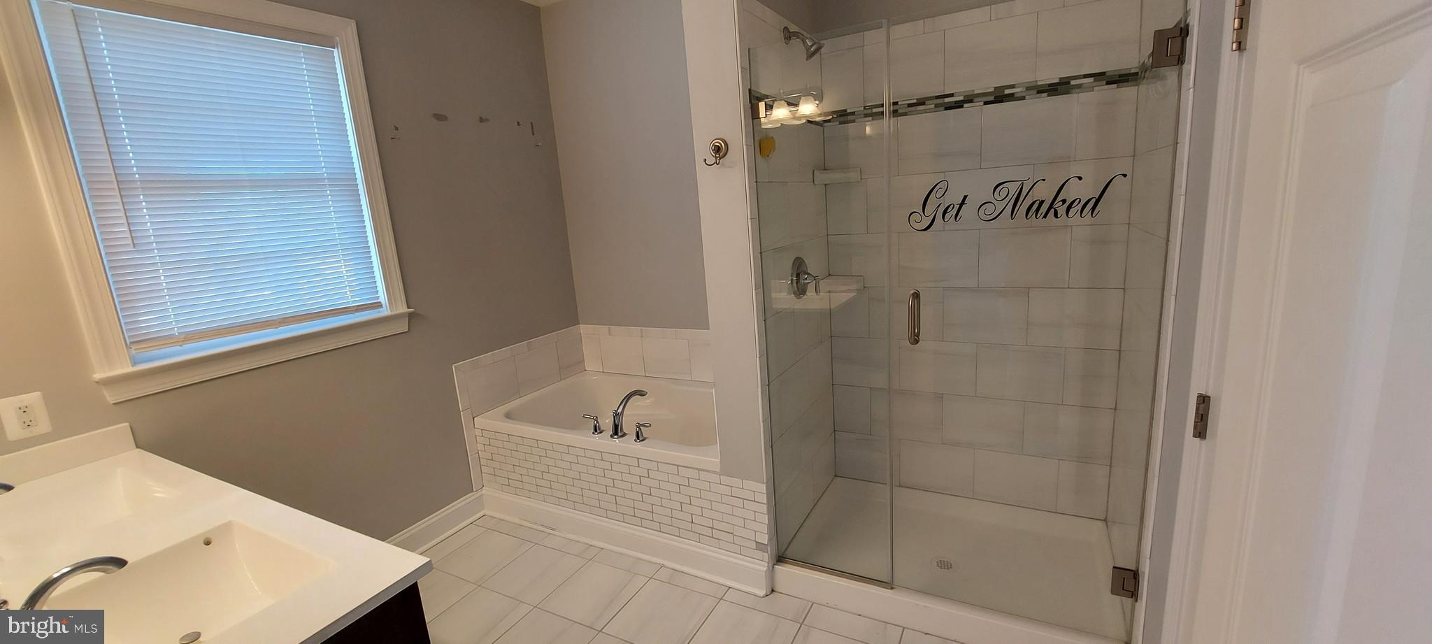 1056 Rye Drive La Plata, MD 20646 - Photo 8 of 23 a bathroom with a tub and a shower