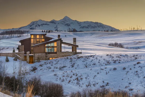 a view of a house with a mountain