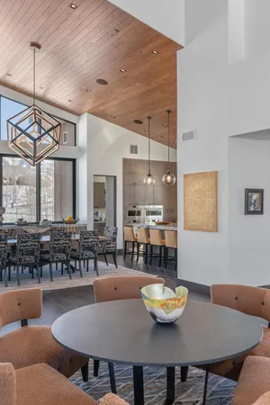 a view of a dining room with furniture and a table