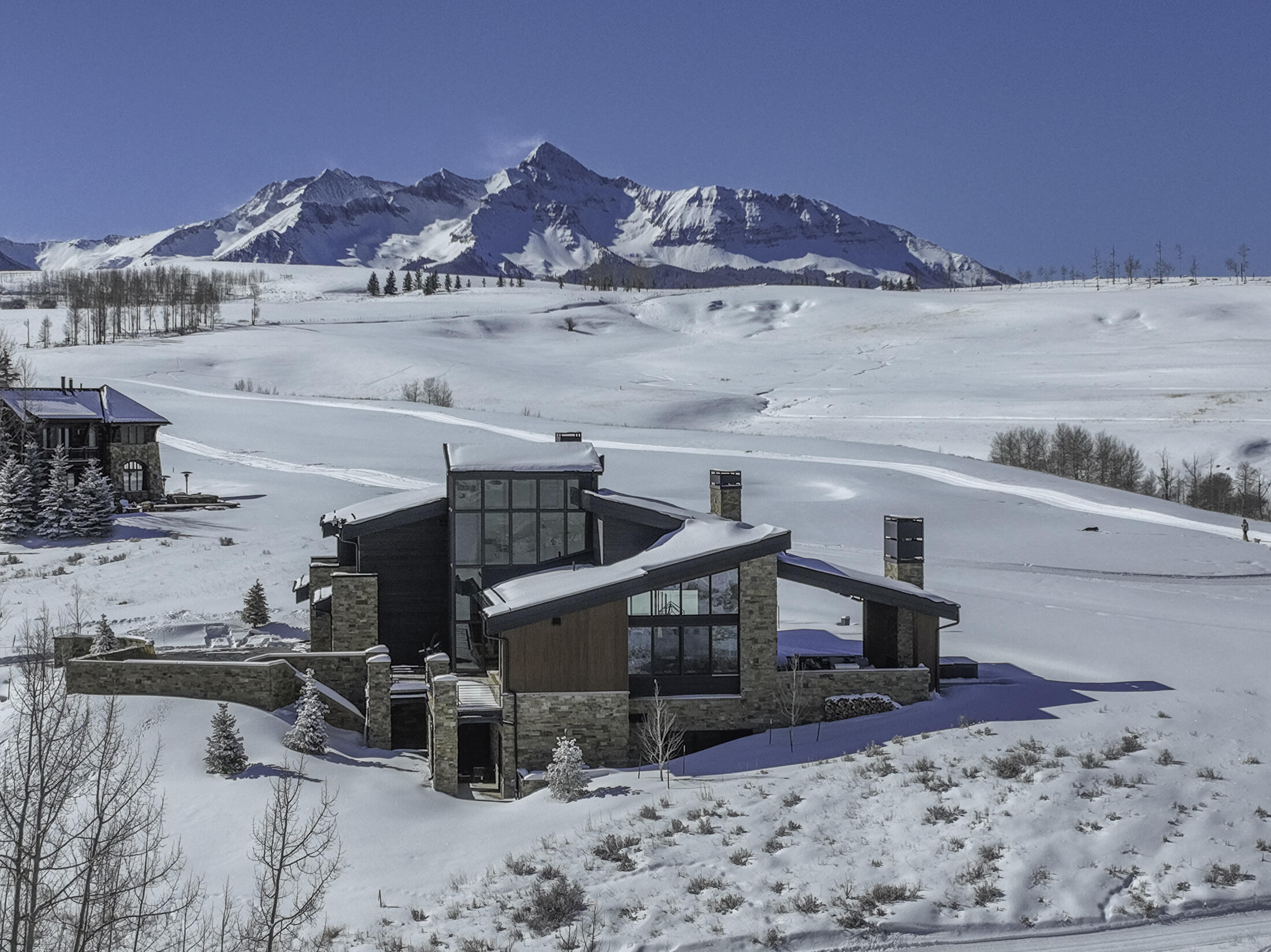 167 Adams Ranch Road Mountain Village, CO 81435 - Photo 26 of 28 a view of a house with a kitchen