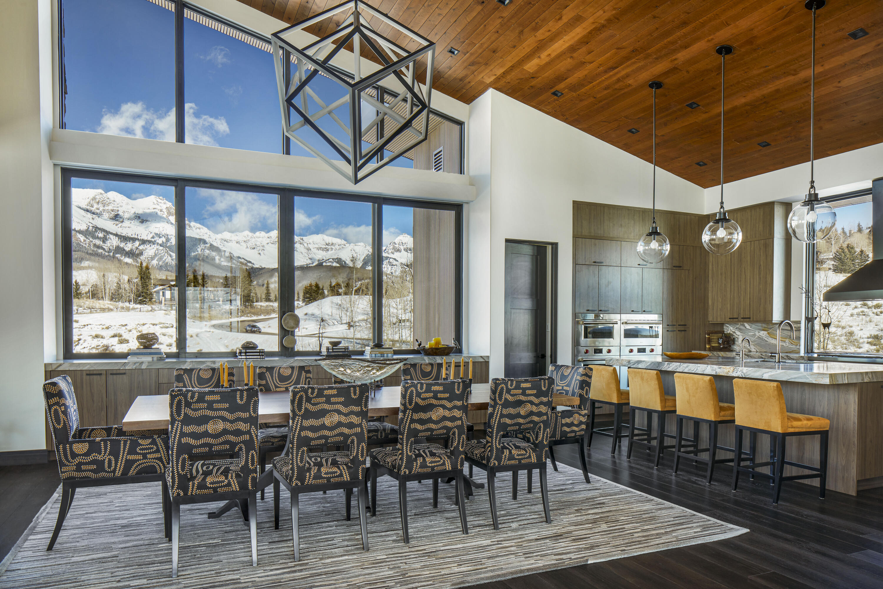 167 Adams Ranch Road Mountain Village, CO 81435 - Photo 3 of 28 a view of a dining room with furniture window and wooden floor